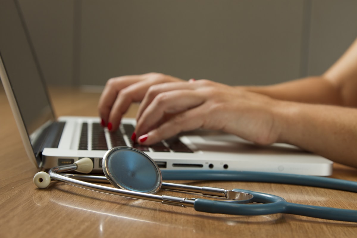 Laptop and stethoscope — HLL Lifecare case study